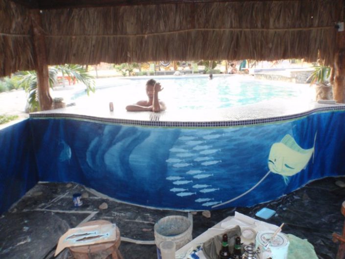 Andrew taking a break in the pool at the swim up bar