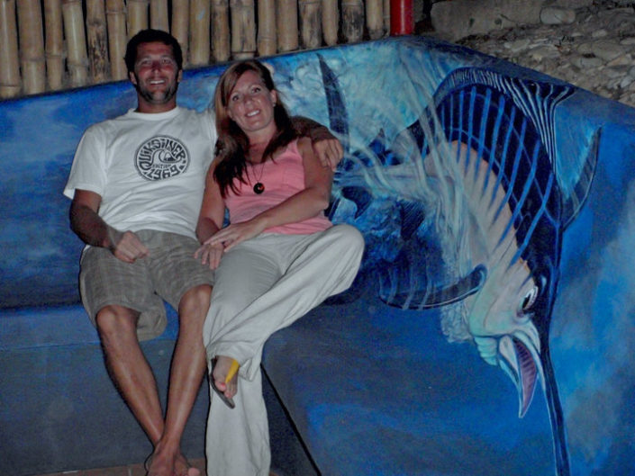 Abby and Eric relaxing next to the finished marlin painting